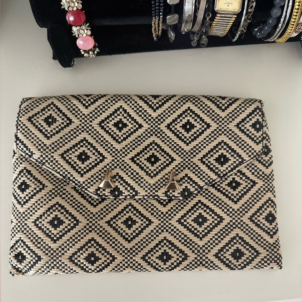 Stella & Dot Geometric Patterned woven Clutch with magnetic closure.